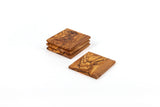 Olive Wood Coaster Set of 4 handcrafted from Mediterranean olive wood – Medolivewood. Sustainable artisan table coasters.